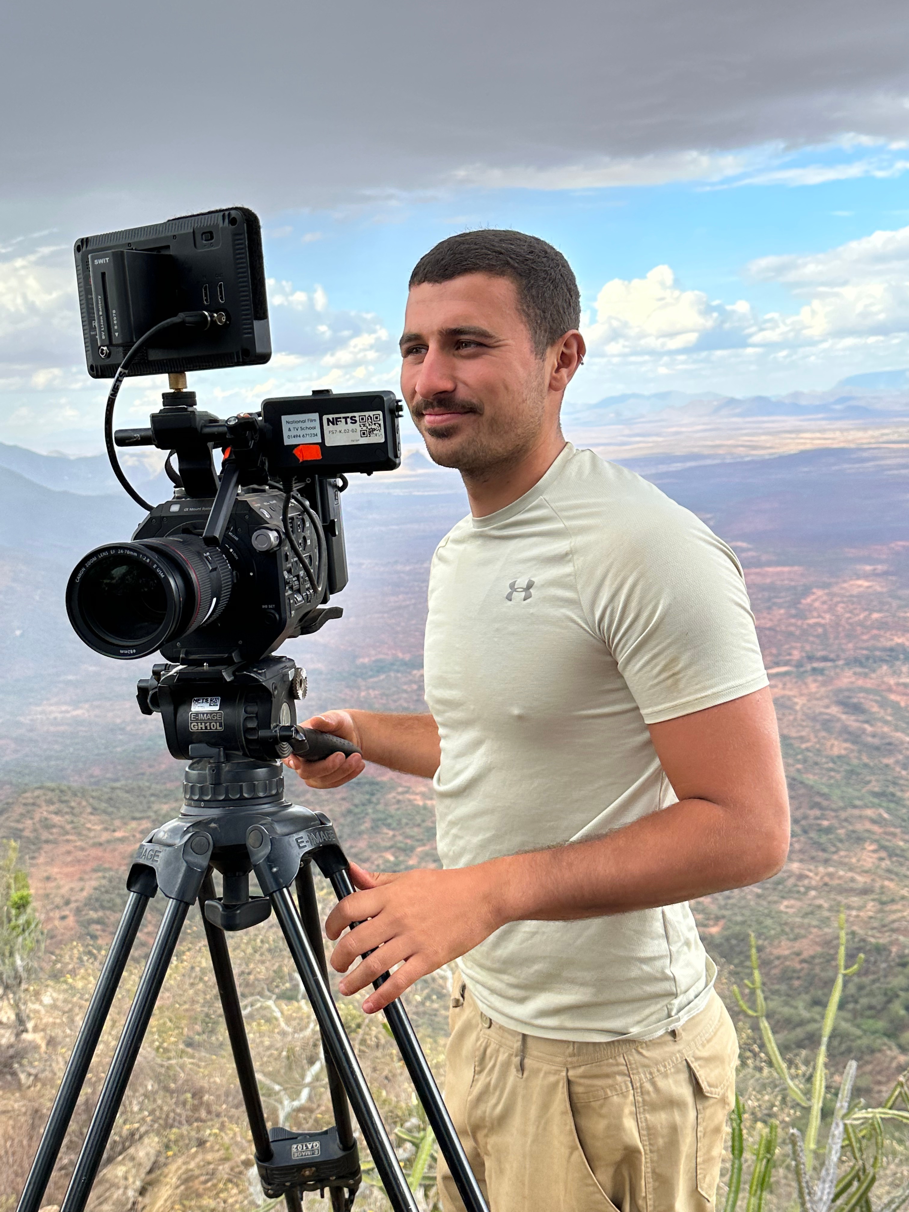 Man with camera in Kenya